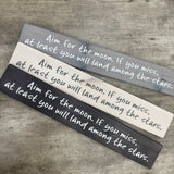 Made in the UK by The Giggle Gift co.
Long&nbsp;L59.5cm Wooden Hanging Plaque;
Quote - "Aim for the moon. If you miss, at least you will land among the stars"
