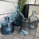 Blue&nbsp;Small&nbsp;Glass Bottle Vases
New styles to add to the collection; - all sold individually so you can mix &amp; match
Wide ribbed/diamond shape and narrow top H13.8cm - £5.00
Ribbed glass bottle W7.4 x H9.9cm - £2.50
Squat glass bottle H10.3cm - £4.00
Decorative fan bottle W13 x D6 x H17 cm - £5.00