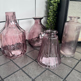 New to the collection - Amethyst Small Glass Bottle Vases
Various styles mix &amp; match and all sold individually;
Wide ribbed/diamond shape &amp; narrow top H13.8cm - £5.00
Ribbed wide base &amp; narrow top W7.4 x H9.9cm - £2.50
Bud Vase H12cm - £3.50
Tall Slim Ribbed&nbsp; H13.2cm - £2.50