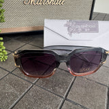 Eliza Gracious designer inspired Sunglasses UV400 protection Collection;


Amelia style has a prominent bold oversized square silhouette &amp; distinctive gold-coloured hardware hinge.&nbsp;
Available in fading tones of Dark Grey to Light Bronw Acetate Transparent