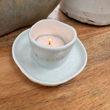 Radar Zen Spirit - Tealight Holder with plate&nbsp;
White Porcelain distorted round t-light holder secured to a dish
Quote in gold text - INHALE&nbsp; EXHALE REPEAT
