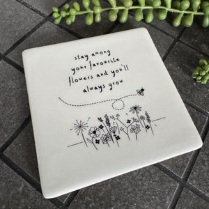 Quotable Square 10cm White Coaster for someone special;
Quote - 'Stay among your favourite flowers and you'll always grow'