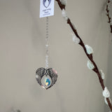 Wildthings - Magical timeless gifts

Handmade in the UK

Hanging Clear Crystal Angel Wing Heart suncatcher&nbsp;supplied with an organza bag