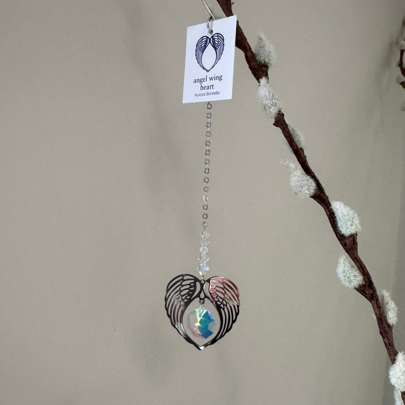 Wildthings - Magical timeless gifts

Handmade in the UK

Hanging Clear Crystal Angel Wing Heart suncatcher supplied with an organza bag
