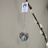Wildthings - Magical timeless gifts

Handmade in the UK

Hanging Clear Crystal Angel Wing Heart suncatcher&nbsp;supplied with an organza bag