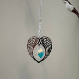 Wildthings - Magical timeless gifts

Handmade in the UK

Hanging Clear Crystal Angel Wing Heart suncatcher&nbsp;supplied with an organza bag