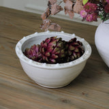 Off White Distressed Ceramic Bowl 34cm with a textured detail around the edge.