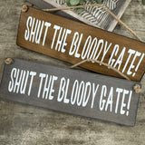 Made in the UK by Giggle Gift Co.
Wooden L29.5cm Hanging Sign
Quote - "Shut the Bloody Gate!"