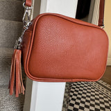 Faux Leather Cross Body Bag with Tassel L21cm

Colour - Brown / Tan