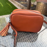 Faux Leather Cross Body Bag with Tassel L21cm

Colour - Brown / Tan