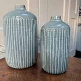 Mid Green/Blue Indented pattern running vertically Ceramic Vases&nbsp;&nbsp;
Available in two sizes; Small H19cm &amp; Large H23.5cm&nbsp;