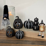 Glossy Black Pumpkin Stack with the quote 'Boo'