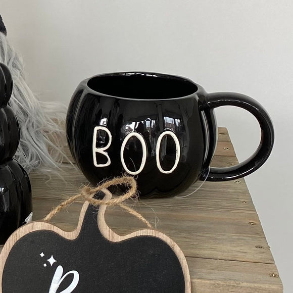 Black Pumpkin Mug 14cm with a quote in white text 'BOO'