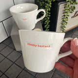 Word Range Medium Bucket White Porcelain Mug 350ml with handstamped quote
Colour font - Orange
Quote - cheeky bastard