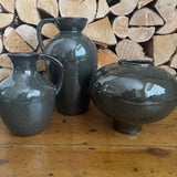 Dark Olive Glazed Ceramic Vases&nbsp;
Available in 3 styles; Short with handle H22cm, Tall with Handle H32.5cm &amp; Round wide vase H20cm