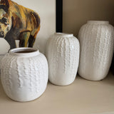 Off White / Cream Glazed Vertical hanging pattern Vases&nbsp;
Available in 3 sizes; Small H18cm, Medium H24cm &amp; Large H29cm&nbsp;

These off white / cream glazed distressed effect ceramic vases have a stylish vertical design; similar to the hanging string of pearls plant all at different lengths and depth