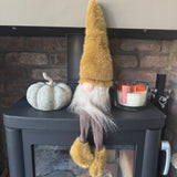 Sitting Fabric Gonk with a faux fur Ochre hat &amp; boots and Brown body &amp; legs H32cm