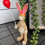 Ruth Rabbit holding a Red Balloon