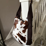 Faux Fur Bag with leather detail & strap - Cow print