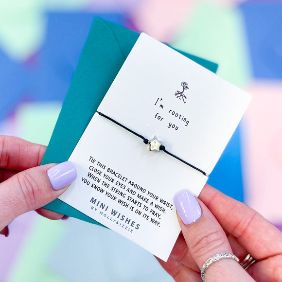 Mini Wishes by Molly & Izzie Cotton cord bracelet with a star bead presented on a card with the quote; 'I'm rooting for you' 