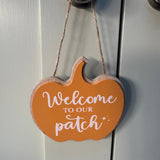 Add this sign to your Autumnal wreath in the centre; Orange Wooden Pumpkin shaped hanging quotable sign 10cm
Quote in white text - 'Welcome to our Patch'&nbsp;