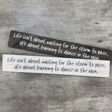 Made in the UK by The Giggle Gift co.
Long&nbsp;L59.5cm Wooden Hanging Plaque;
Quote - "Life isn't about waiting for the storm to pass, it's about learning to dance in the rain."