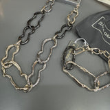 Eliza Gracious quality affordable design led branded costume jewellery

Mis-shaped Chain Link Bracelet with a fastener &amp; extra links for length
Mixed gold mix colour