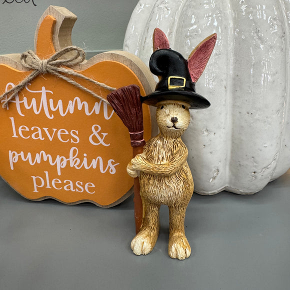 Ruth Rabbit standing H14cm holding a Broomstick wearing a Witch's Hat