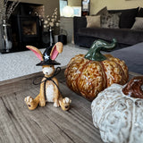 Sitting Ruth Rabbit Figure wearing a Witches hat H11cm