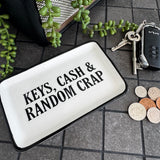 White Ceramic Small 16.5x10cm Dish with a quote in black text;
'Keys, Cash &amp; Random Crap'&nbsp;
