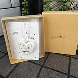 Belly Button Designs - Unique British Brand

Signature Collection - Gifted with love
Mini Porcelain Heart decoration on sentiment card &amp; Gift boxed
Quote - Congratulations