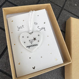 Belly Button Designs - Unique British Brand

Signature Collection - Gifted with love
Mini Porcelain Heart decoration on sentiment card &amp; Gift boxed
Quote - Congratulations