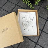 Belly Button Designs - Unique British Brand

Signature Collection - Gifted with love
Mini white Porcelain Heart decoration on card 'Just to say' &amp; Gift boxed 10cm
Quote - Lovely mum