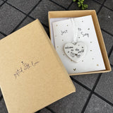 Belly Button Designs - Unique British Brand

Signature Collection - Gifted with love
Mini white Porcelain Heart decoration on card 'Just to say' &amp; Gift boxed 10cm
Quote - Welcome to the world