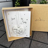 Belly Button Designs - Unique British Brand

Signature Collection - Gifted with love
Mini white Porcelain Heart decoration on card 'Just to say' &amp; Gift boxed 10cm
Quote - Welcome to the world