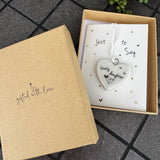 Belly Button Designs - Unique British Brand

Signature Collection - Gifted with love
Mini white Porcelain Heart decoration on card 'Just to say' &amp; Gift boxed 10cm
Quote - Lovely daughter