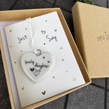 Belly Button Designs - Unique British Brand

Signature Collection - Gifted with love
Mini white Porcelain Heart decoration on card 'Just to say' &amp; Gift boxed 10cm
Quote - Lovely daughter