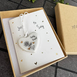 Belly Button Designs - Unique British Brand

Signature Collection - Gifted with love
Mini white Porcelain Heart decoration on card 'Just to say' &amp; Gift boxed 10cm
Quote - Lovely Friend