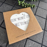 Belly Button Designs - Unique British Brand

Signature Collection decorated with bird motif - Gifted with love

White Ceramic glazed 11cm Heart shaped Coaster;
Cute bunting illustration with the bird motif sat on top &amp; delicate gold foil star &amp; hearts accent with the quote 'Tea time is me Time'
