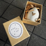 Belly Button Designs -&nbsp;Signature Collection
3D White glazed Porcelain Shaped Token - Bud Vase with small gold heart
Presented in a brand Kraft box with the quote - 'Thank you so much'