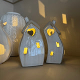 Stone Glazed Ceramic Light up Houses with heart detail
LR44 Battery operated that can be replaced
Bulbous Wide split Houses H14cm&nbsp;