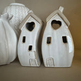 Stone Glazed Ceramic Light up Houses with heart detail
LR44 Battery operated that can be replaced
Bulbous Wide split Houses H14cm&nbsp;
