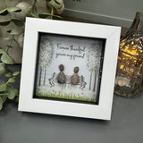 Pebble Art by La De Da Living&nbsp;

Award winning keepsake gifts - Handmade in the Cotswolds&nbsp;
Mini Glitter Framed Pebble Art - White block square frame 12.5cm
'Forever grateful you're my friend' with glitter on the trees