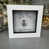 Pebble Art by La De Da Living&nbsp;

Award winning keepsake gifts - Handmade in the Cotswolds&nbsp;
Mini Framed Pebble Art - White block square frame 12.5cm
'Happy 40th Birthday' with cluster of balloons..