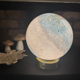 Glass Pebble Hand-Blown Lamp H18cm
Design - Sand &amp; Sea
Cordless &amp; Rechargeable Lamp
Includes gold chrome base