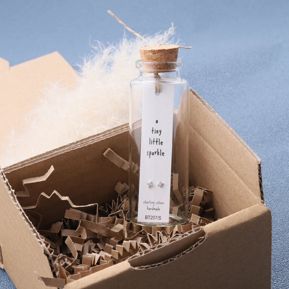 Attic Creations - gifting life's precious moments since 2010;



Message in a Bottle Sterling Silver Stud Earrings handmade in Devon
Style - Little sparkle star earrings with an inlaid with clear diamante crystal 
Quote on the card - 'A Tiny Little Sparkle'