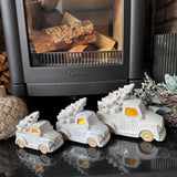 Neutral glazed Ceramic LED Car carrying a christmas Tree on the roof
Available in 3 sizes: Small 11cm &amp; Large 14cm