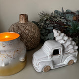 Neutral glazed Ceramic LED Car carrying a christmas Tree on the roof