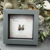 Pebble Art by La De Da Living&nbsp;

Award winning keepsake gifts - Handmade in the Cotswolds&nbsp;

Mini Framed Pebble Art - Grey block square frame 12.5cm
'Here's to forever, Happy Engagement'
