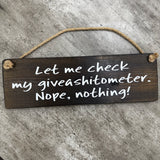 Wooden Hanging Sign - "Let me check my giveashitometer..."